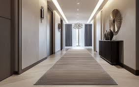 Quiet entrance hallway with warm lamp and wooden bench